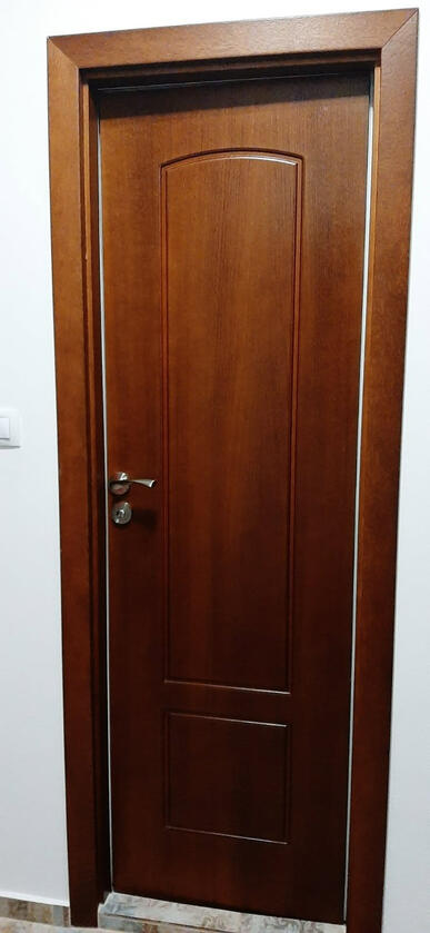 Corridor-facing side Decorative corridor-facing side of a two-in-one bathroom door